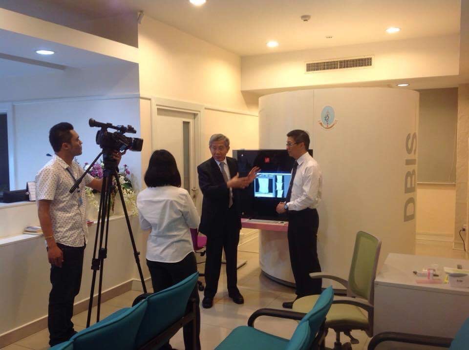 Dr. Krit and Jesse explaining to the Thai media about DBIS